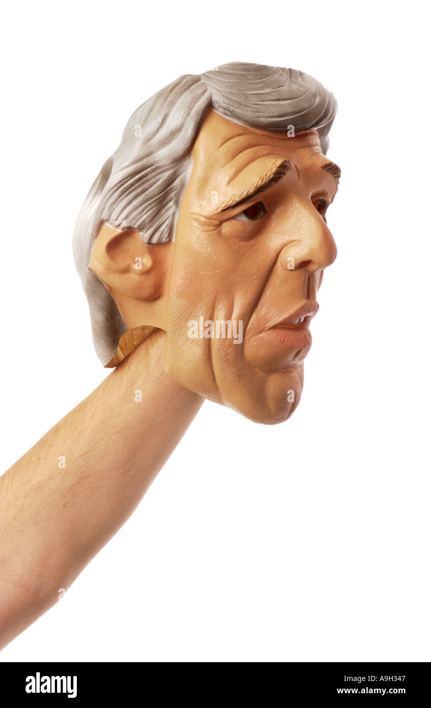 John Kerry maschera sul braccio teso Foto Stock