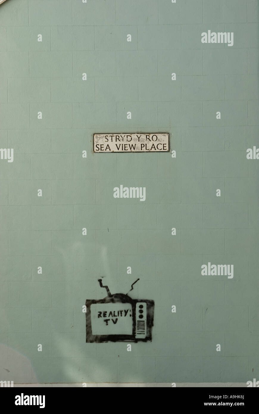 La reality TV graffiti, Aberystwyth Foto Stock