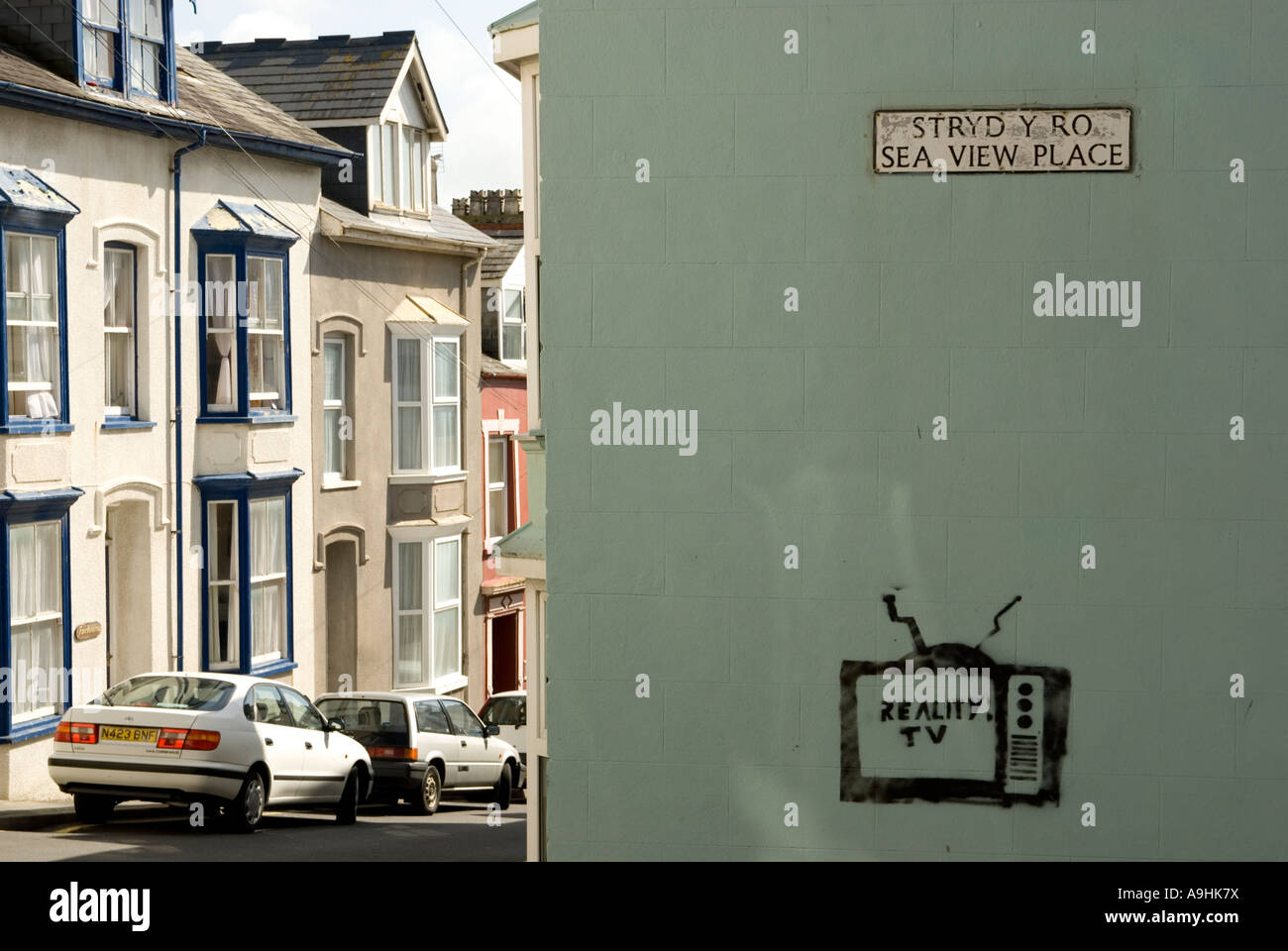 La reality TV graffiti, Aberystwyth Foto Stock