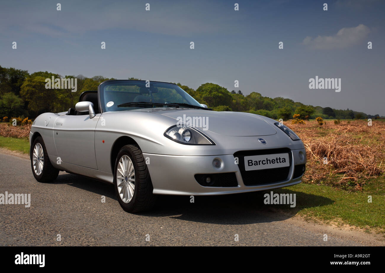 Argento Fiat Barchetta Auto sportiva, New Forest, Hampshire, Inghilterra Foto Stock