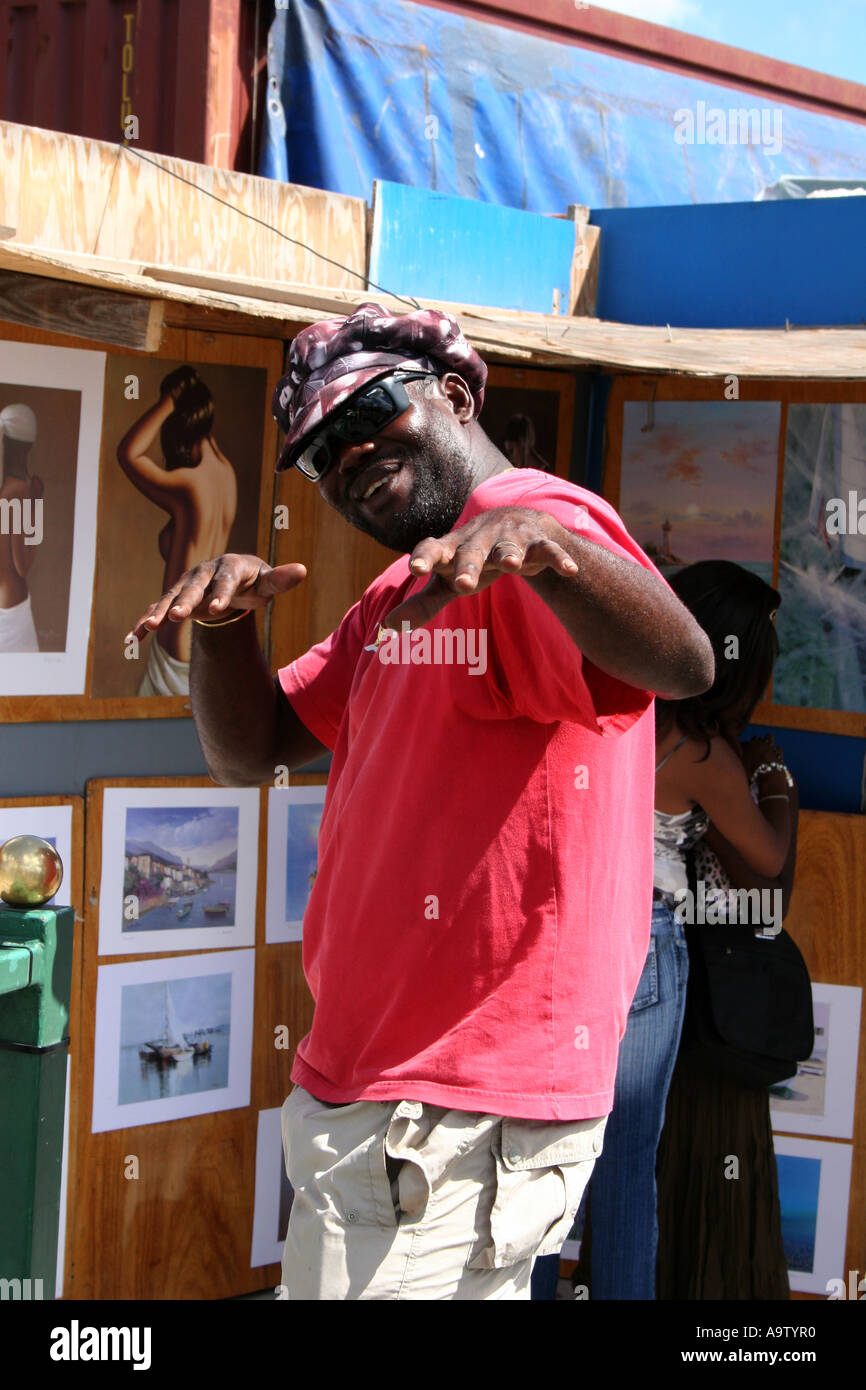 West Indian, maschio Bajan venditore foto in posa per la fotocamera in Barbados Foto Stock