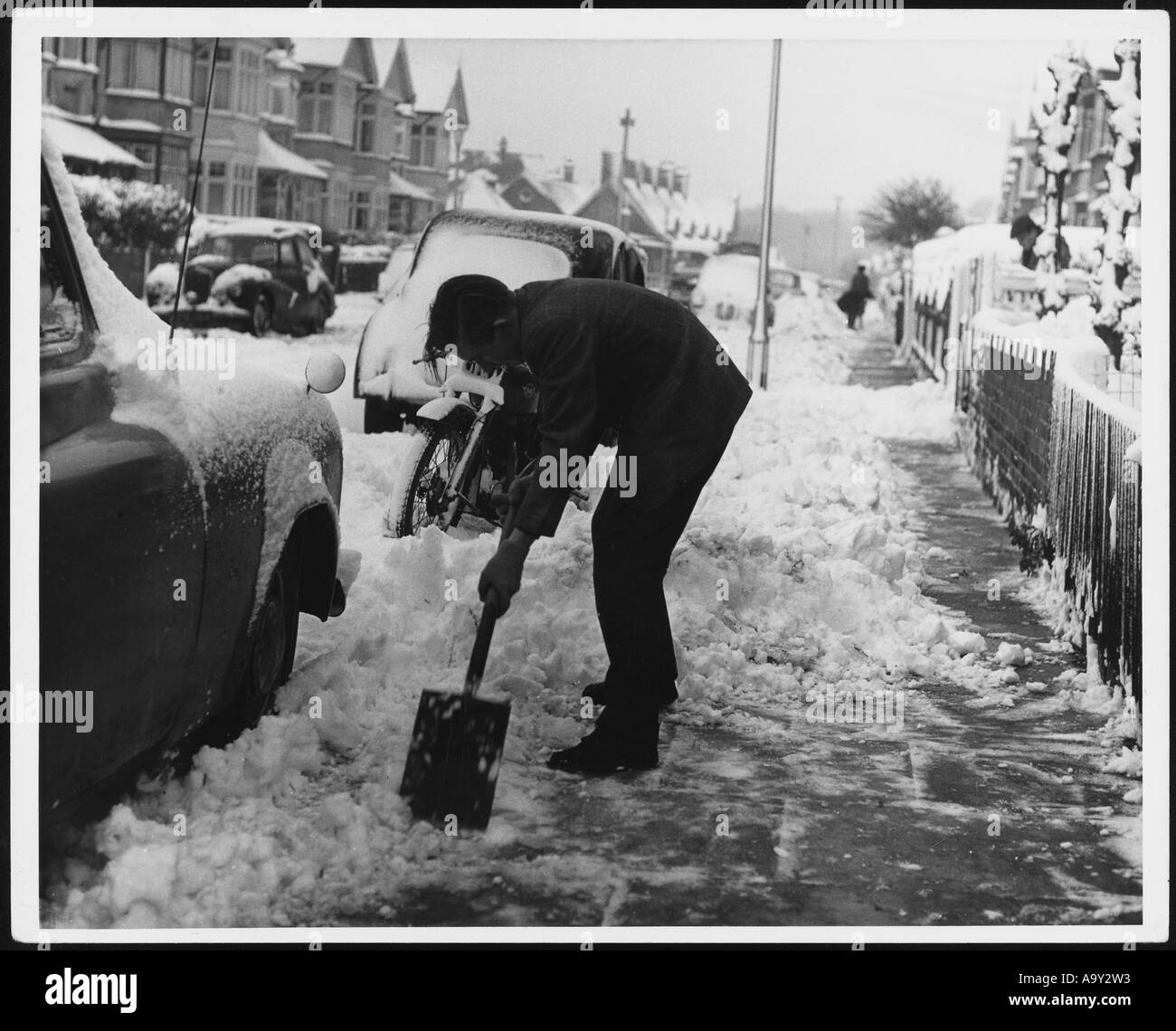 Uomo cancella neve Foto Stock
