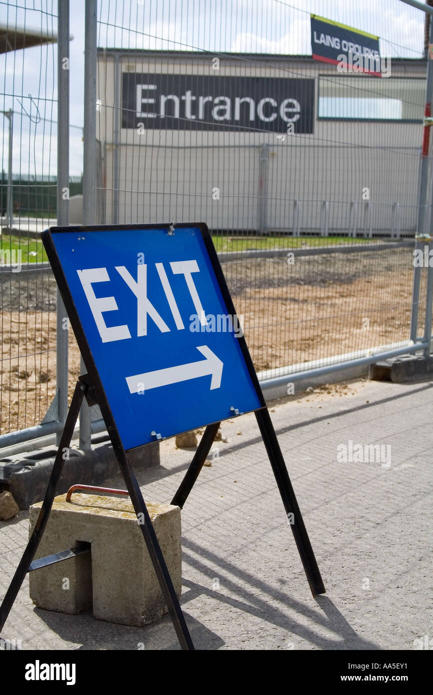 Esci e segni di ingresso Foto Stock