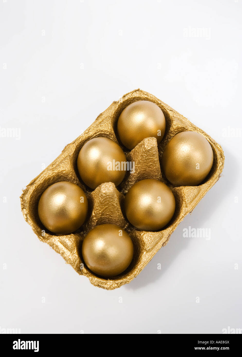 Golden uova in una scatola per uova Foto Stock
