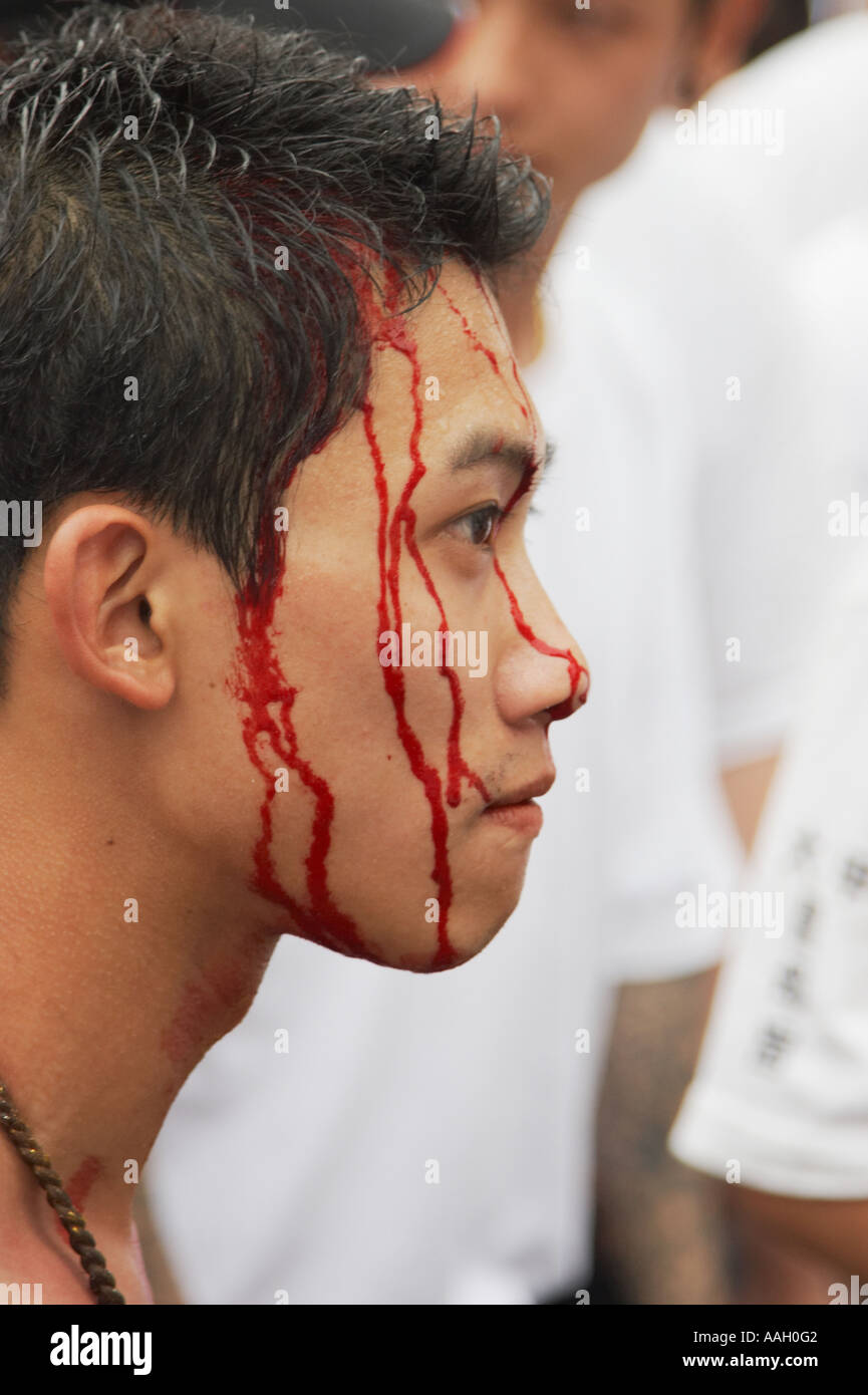 Matsu devoto con ferite Self-Inflicted Foto Stock