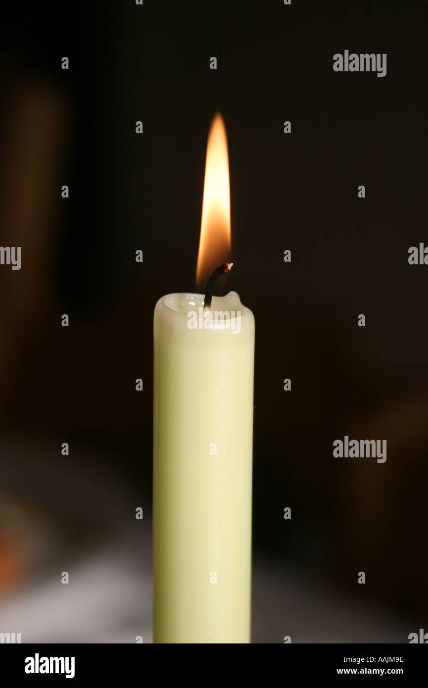 White candela che brucia Foto Stock