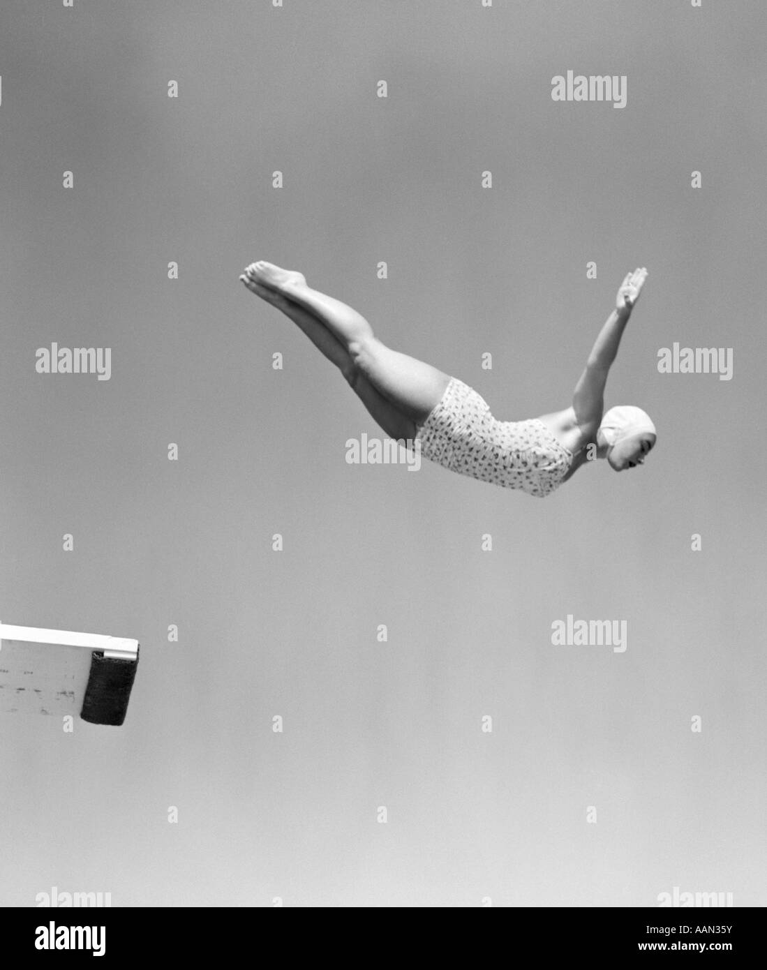 Anni Cinquanta donna cigno immersione subacquea fuori bordo pezzo COSTUME CAP Foto Stock