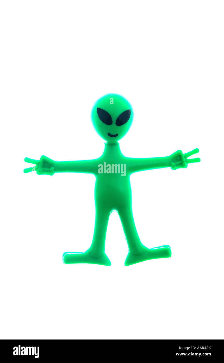 Un giocattolo alieno in plastica con le braccia aperte Foto Stock