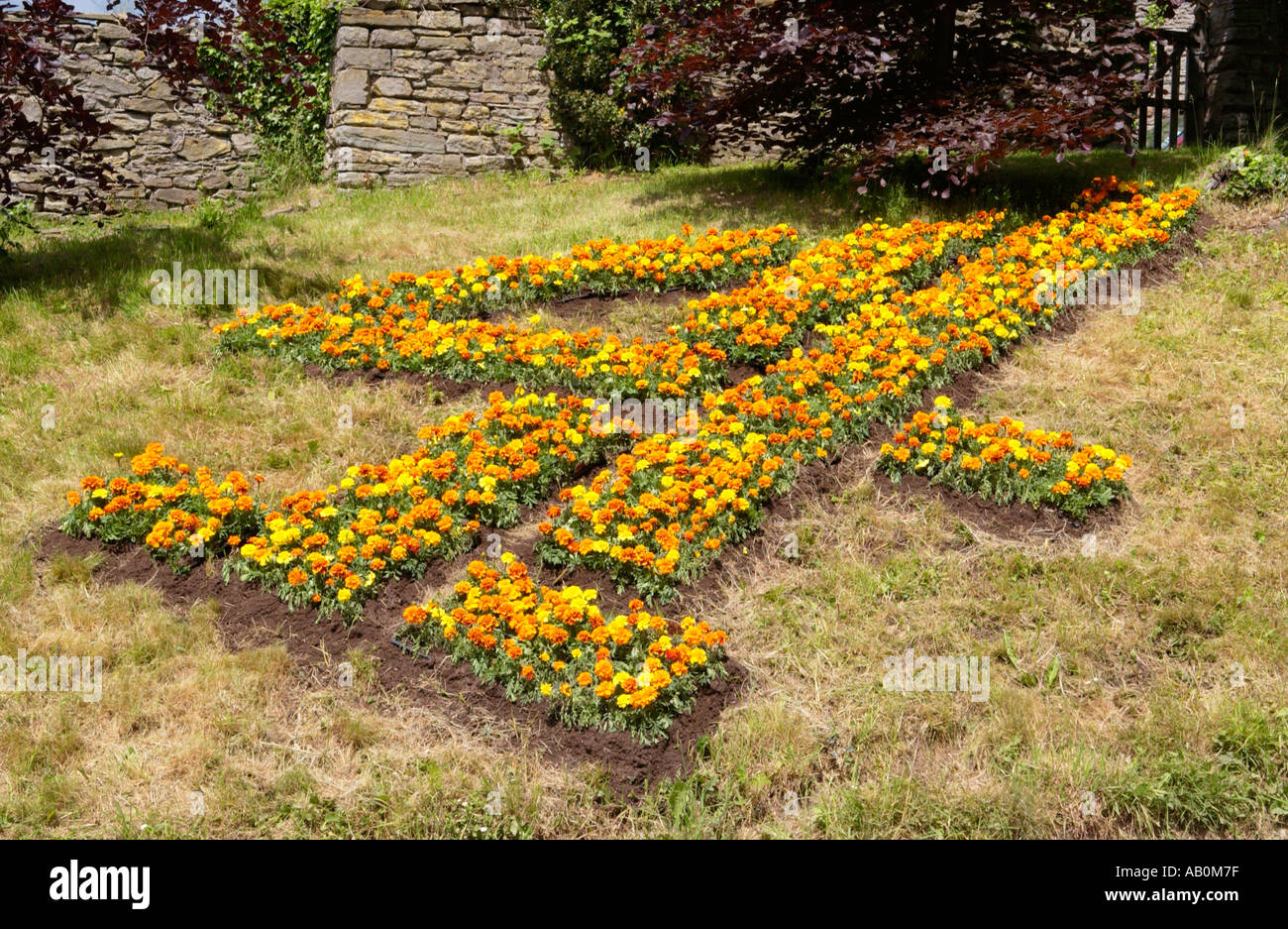 Canale 4 logo televisivo realizzato con fiori di fieno al sito del Festival Hay on Wye Powys Wales UK Foto Stock