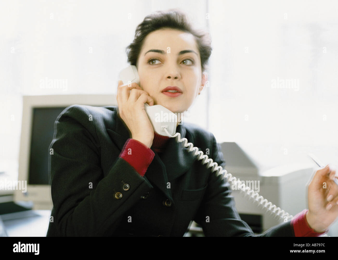 Business donna al telefono Foto Stock