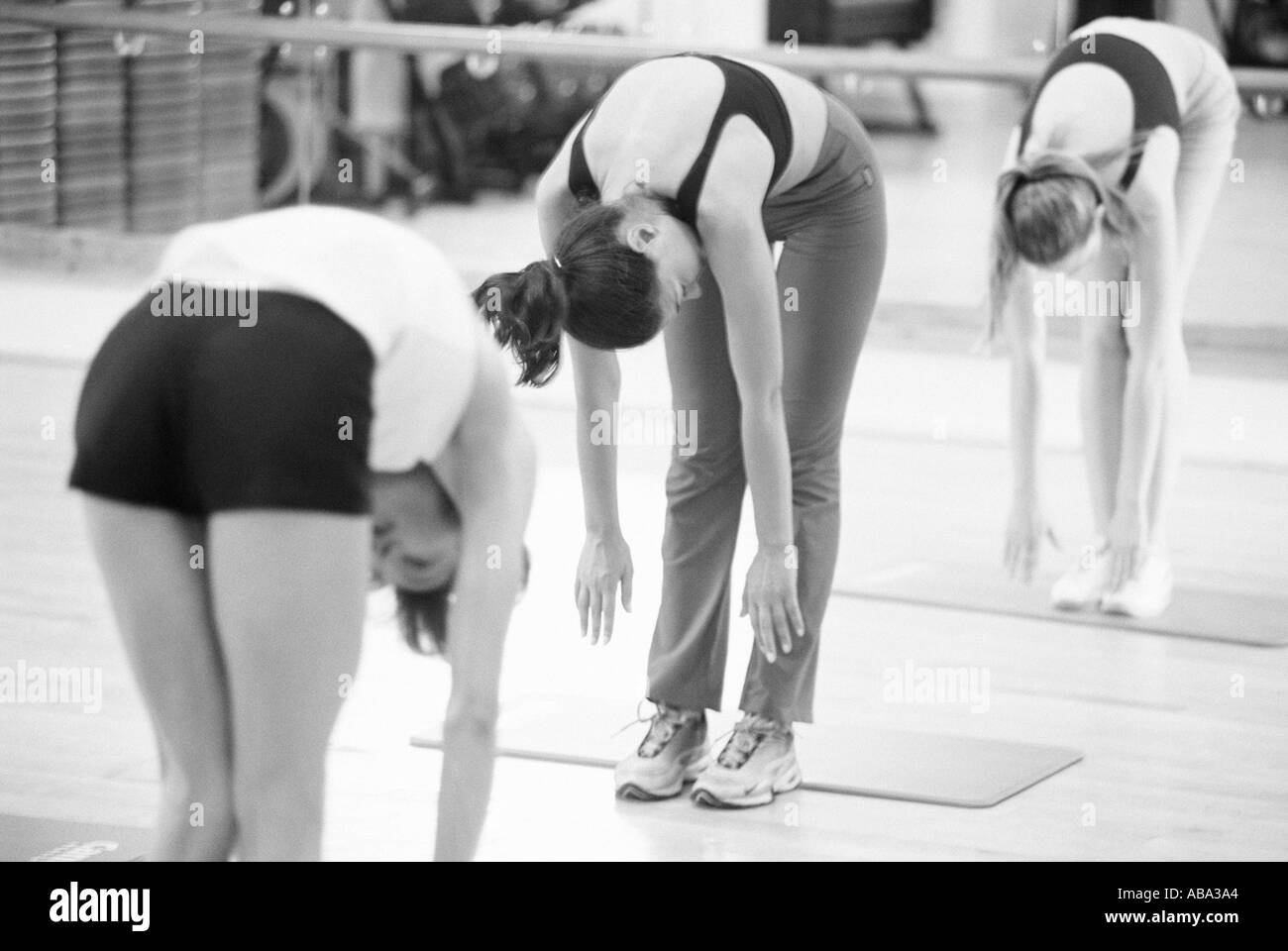 Donne stretching Foto Stock