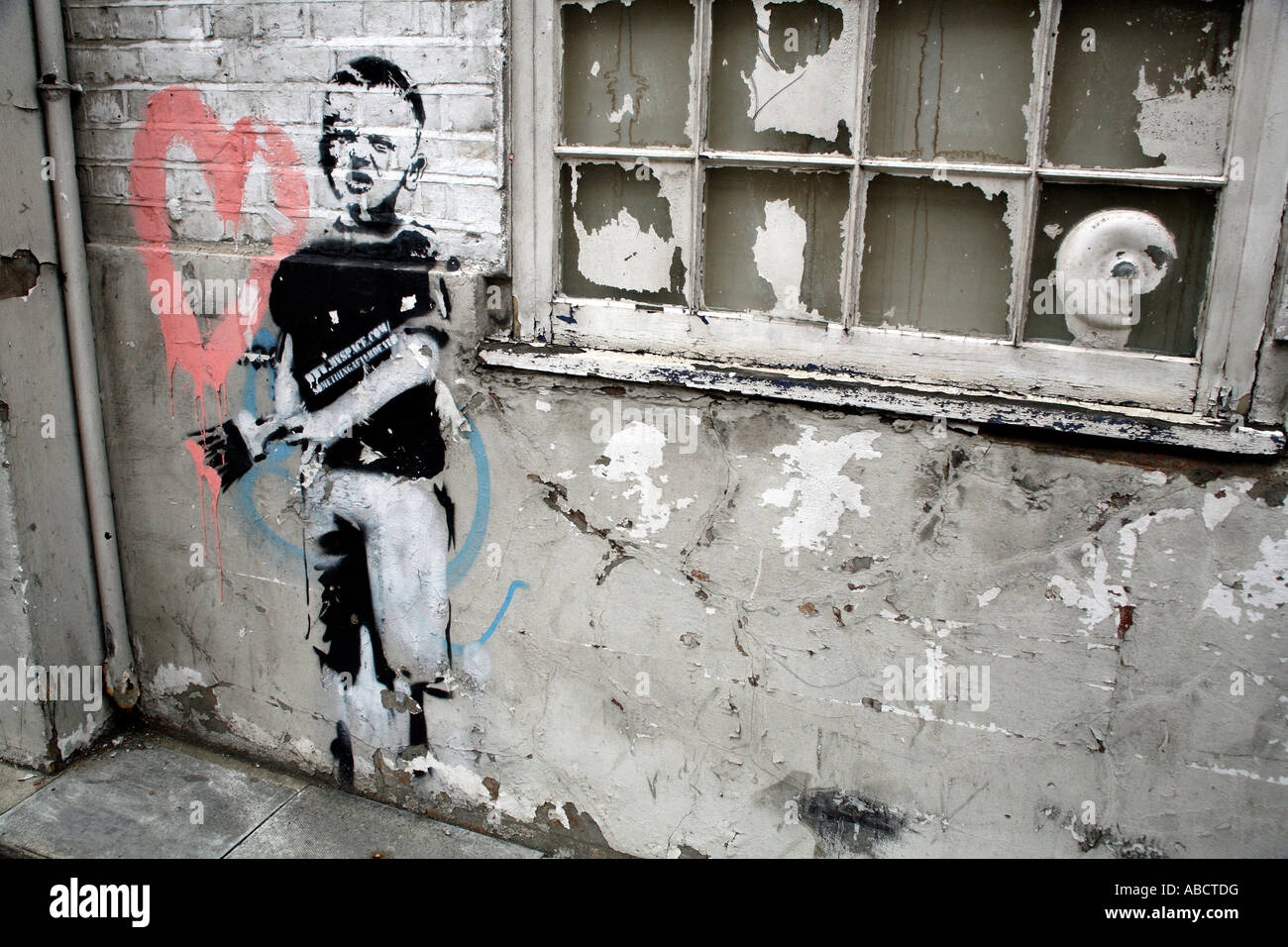 Banksy stencil di boy nel cuore di pittura, Islington, Londra Foto Stock
