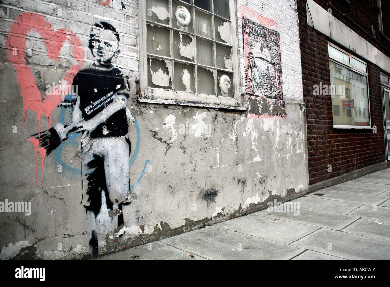 Banksy stencil di boy nel cuore di pittura, Islington, Londra Foto Stock