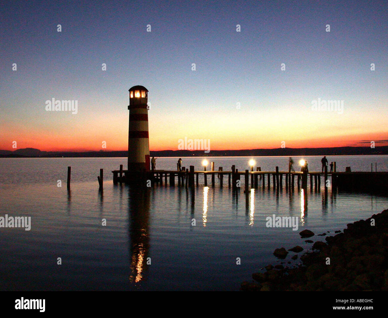 Sera paesaggio con faro Foto Stock