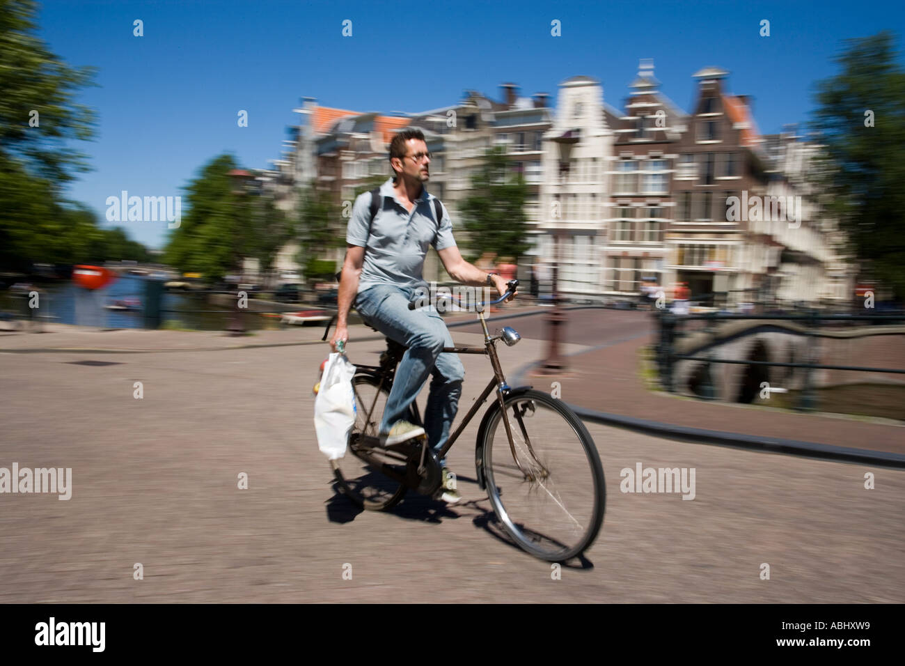 Ciclista in Keizersgracht Foto Stock