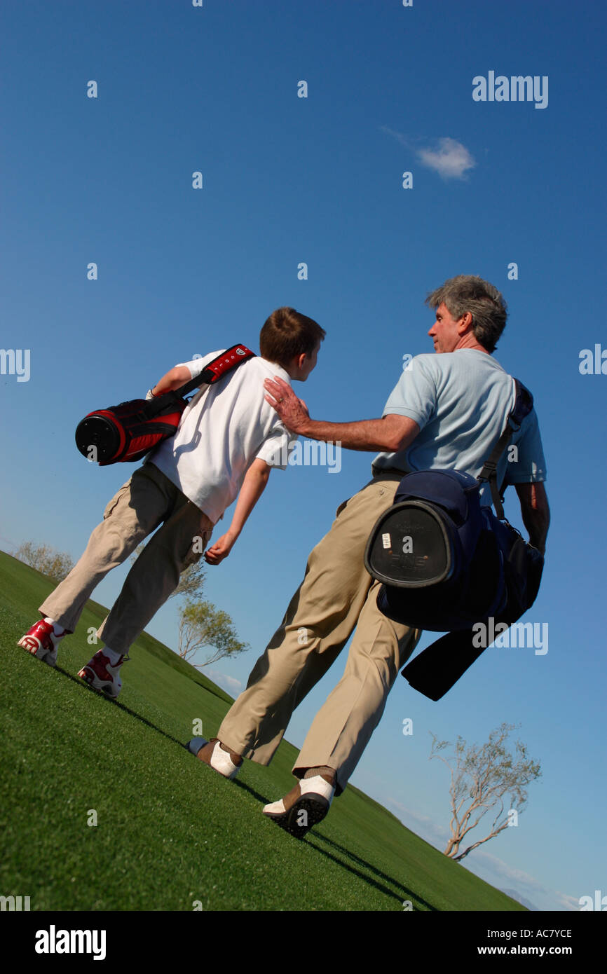 Padre e Figlio sul campo da Golf Foto Stock