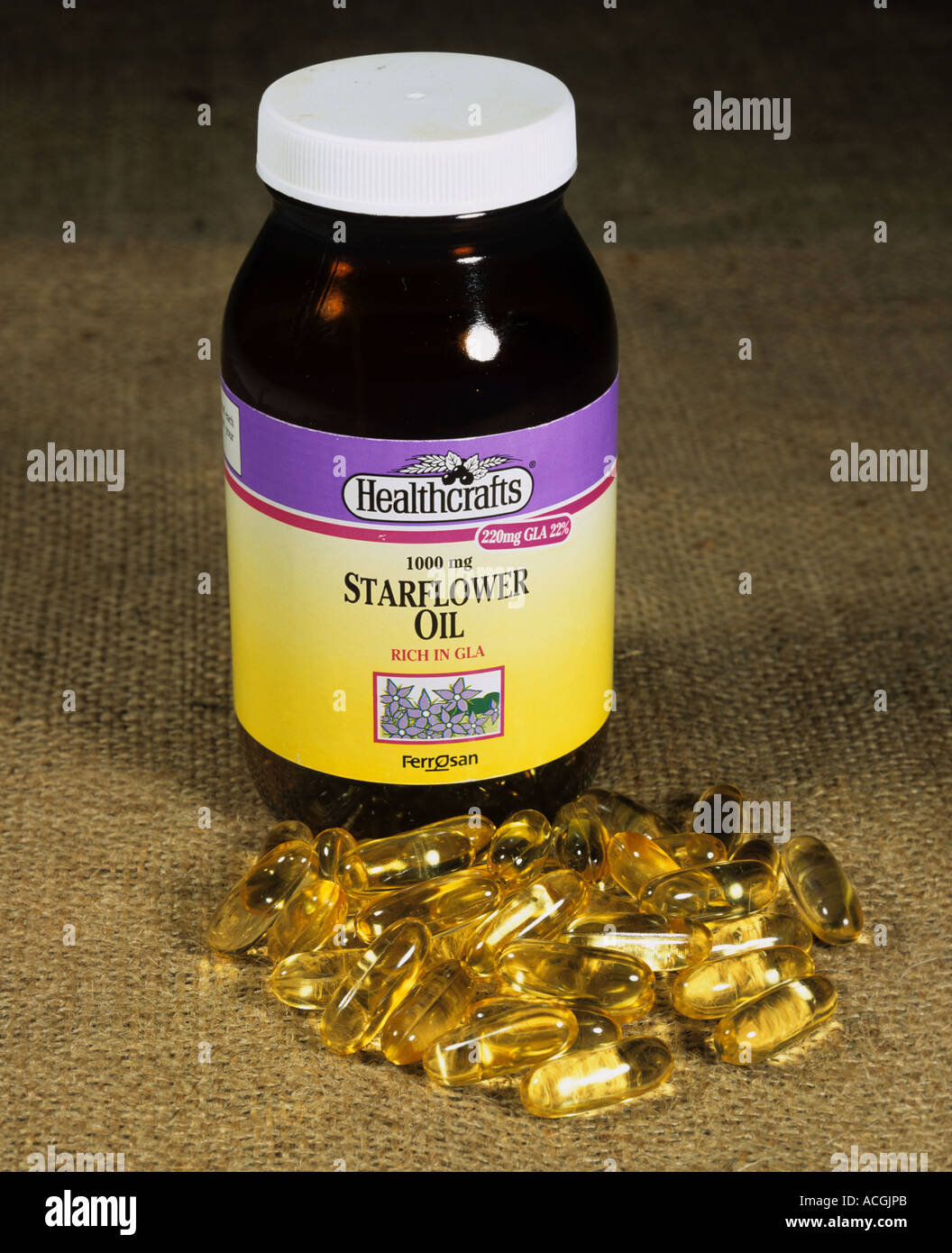 Bottiglia di olio starflower capsule salute integratore alimentare Foto Stock