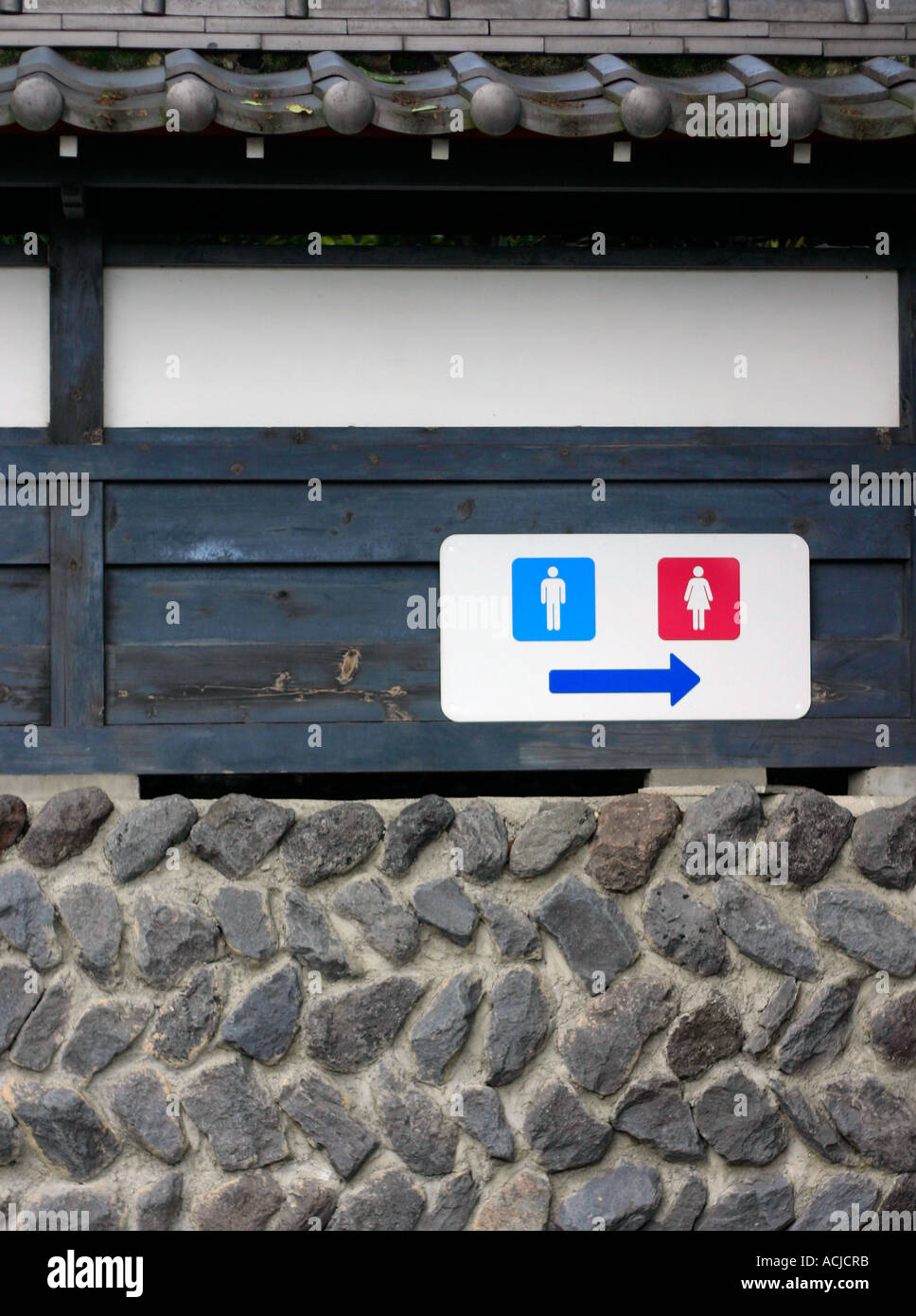 Servizi igienici segno sulla antica parete del tempio Foto Stock