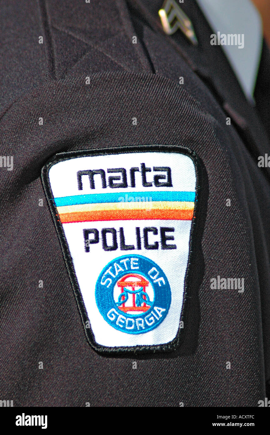 ID patch dal transito di Marta le uniformi della polizia nella zona di Atlanta in Georgia legge i treni e gli autobus pubblici Foto Stock