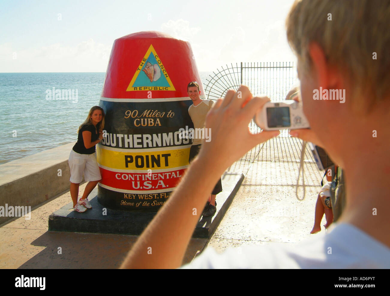 Il punto più meridionale negli Stati Uniti continentali Tourist scattare delle foto di un altro per il marcatore Foto Stock