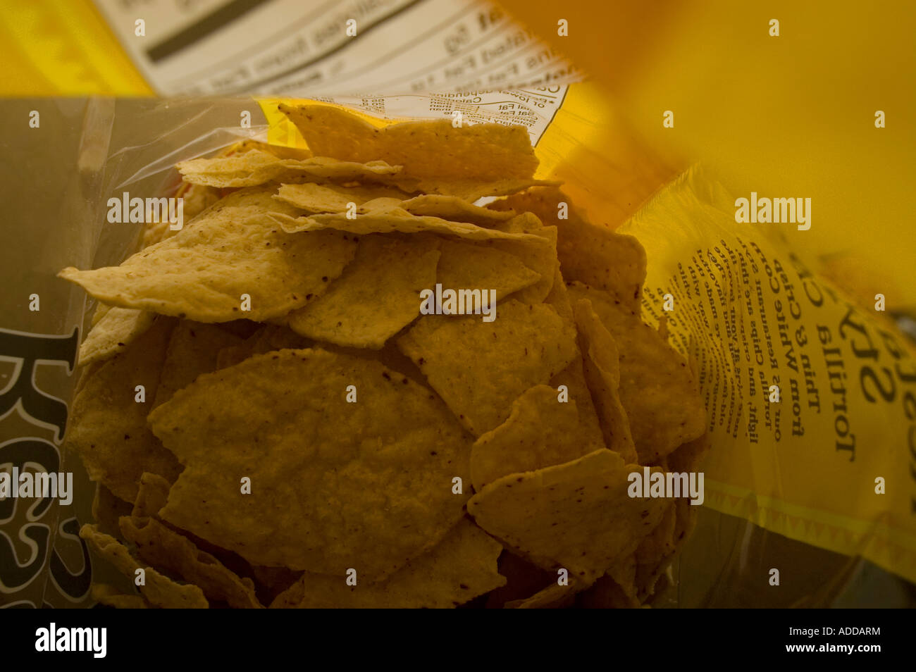 Un sacco di sale free tortilla chips realizzata con pietra di massa di mais bianco Foto Stock