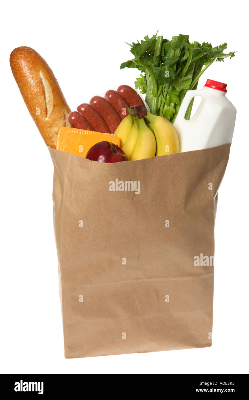 Carta sacchetto shopper piena di negozi di generi alimentari Foto Stock