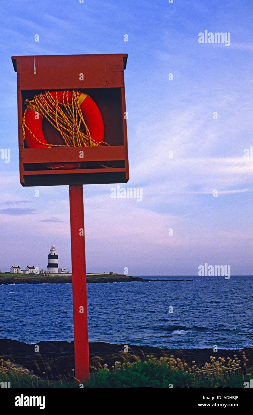 La vita della cinghia e Light House a testa a gancio nella Contea di Wexford in Irlanda Foto Stock