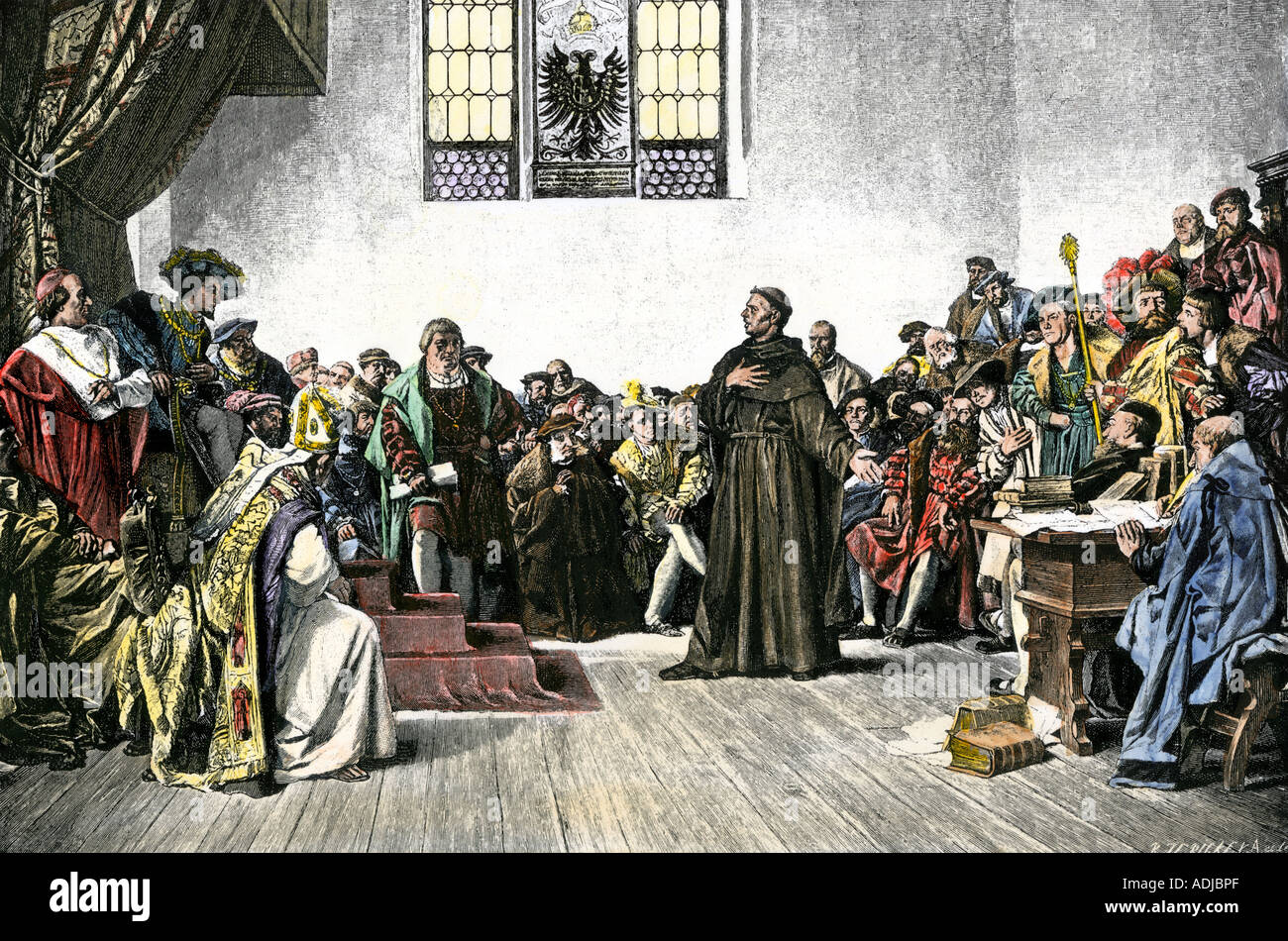 Martin Lutero a difendere le loro idee eretiche alla dieta di Worms 1521. Colorate a mano la xilografia Foto Stock