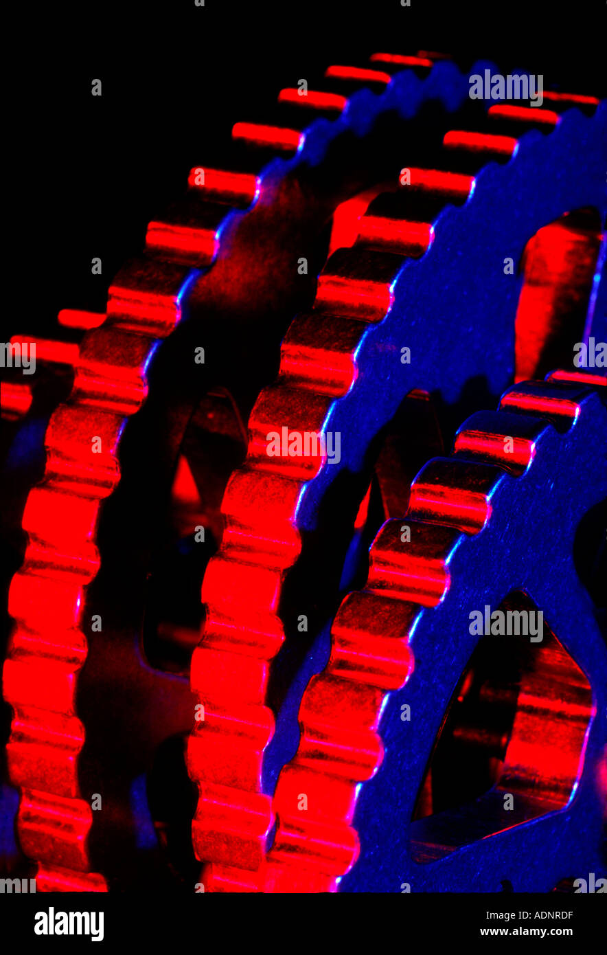 Il rosso e il blu di ingranaggi Foto Stock