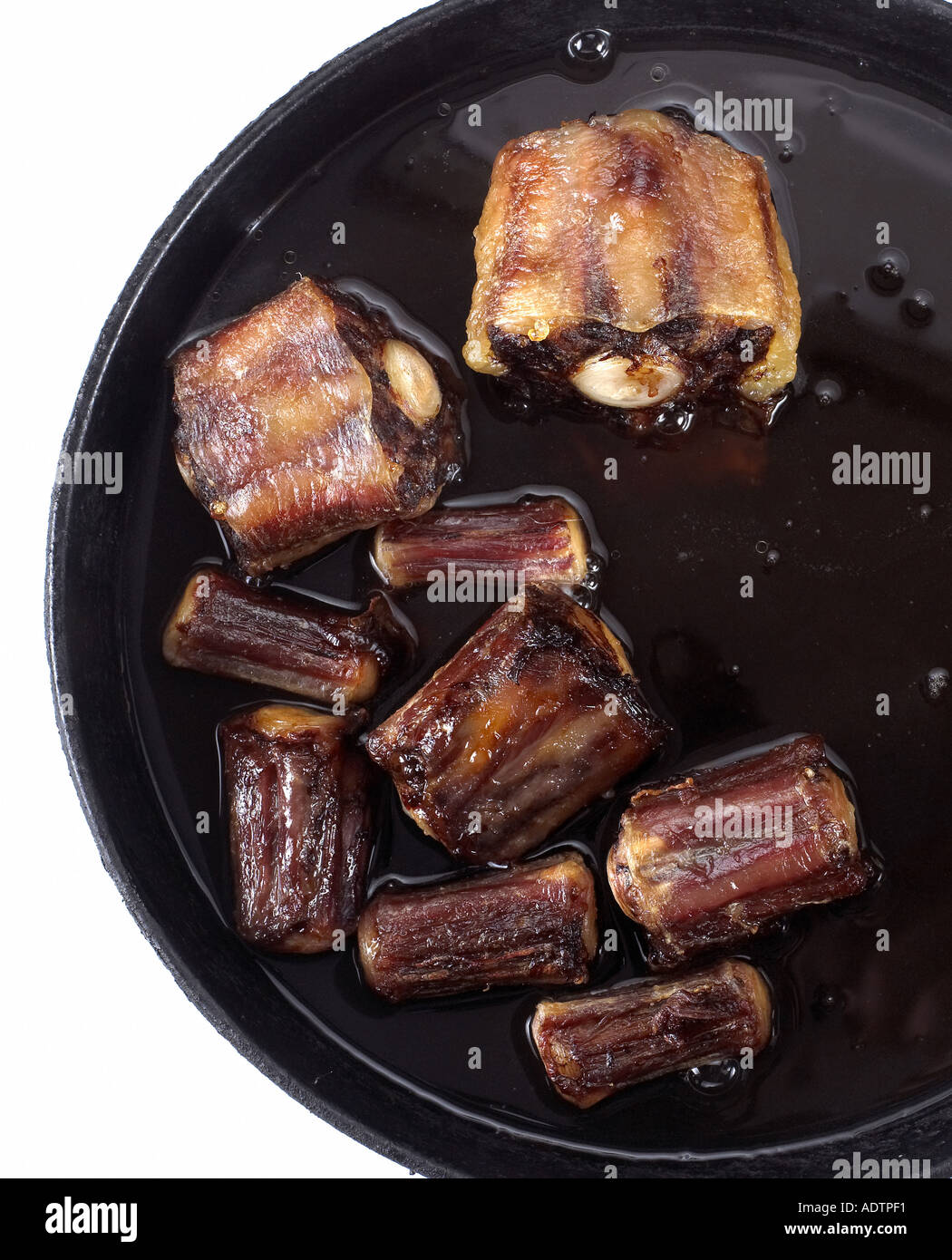 Nove Oxtails cottura in padella Foto Stock
