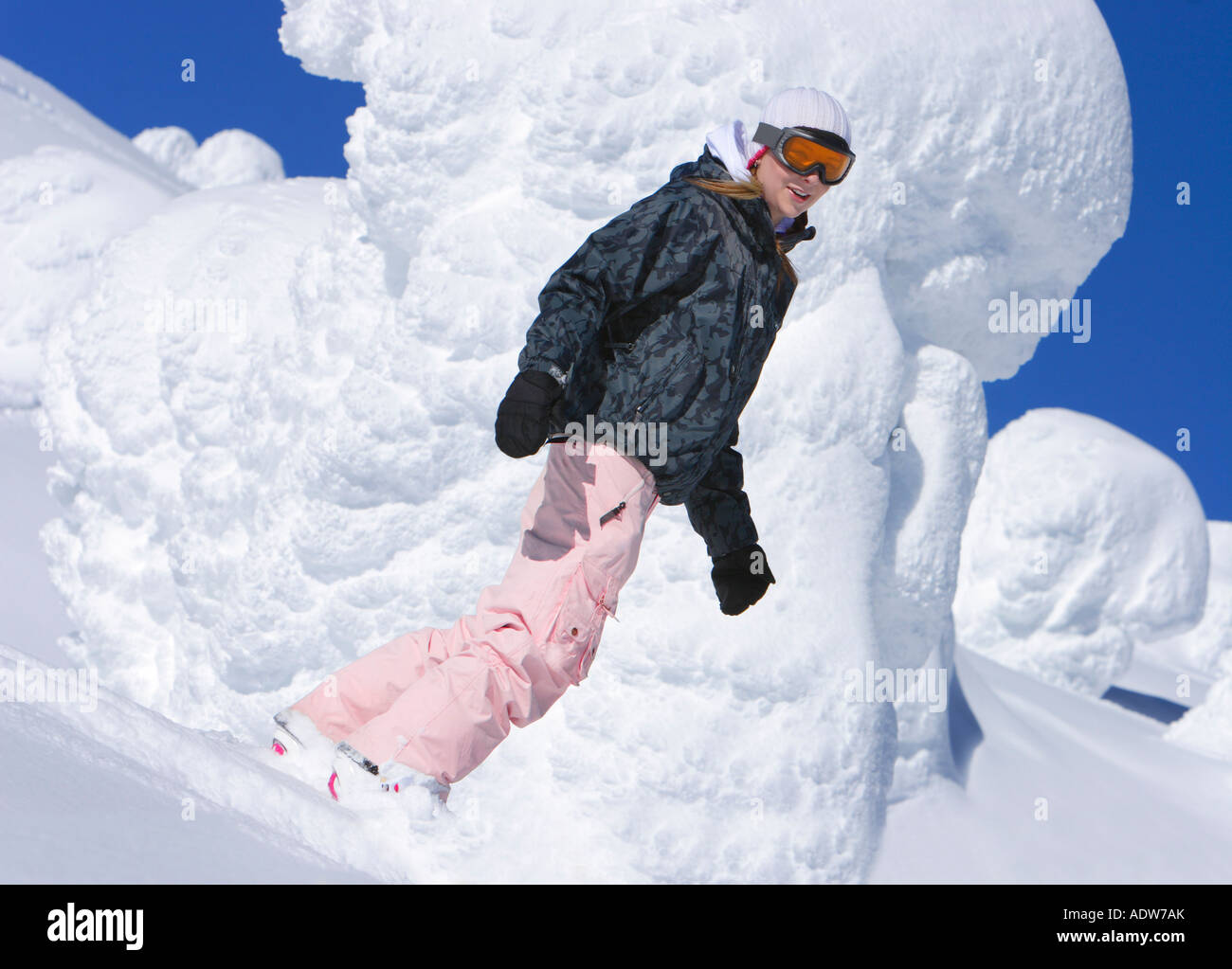 Snowboarder femmina Foto Stock