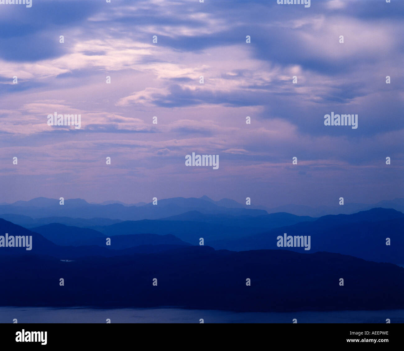 Lontane colline di Western Isles della Scozia Foto Stock