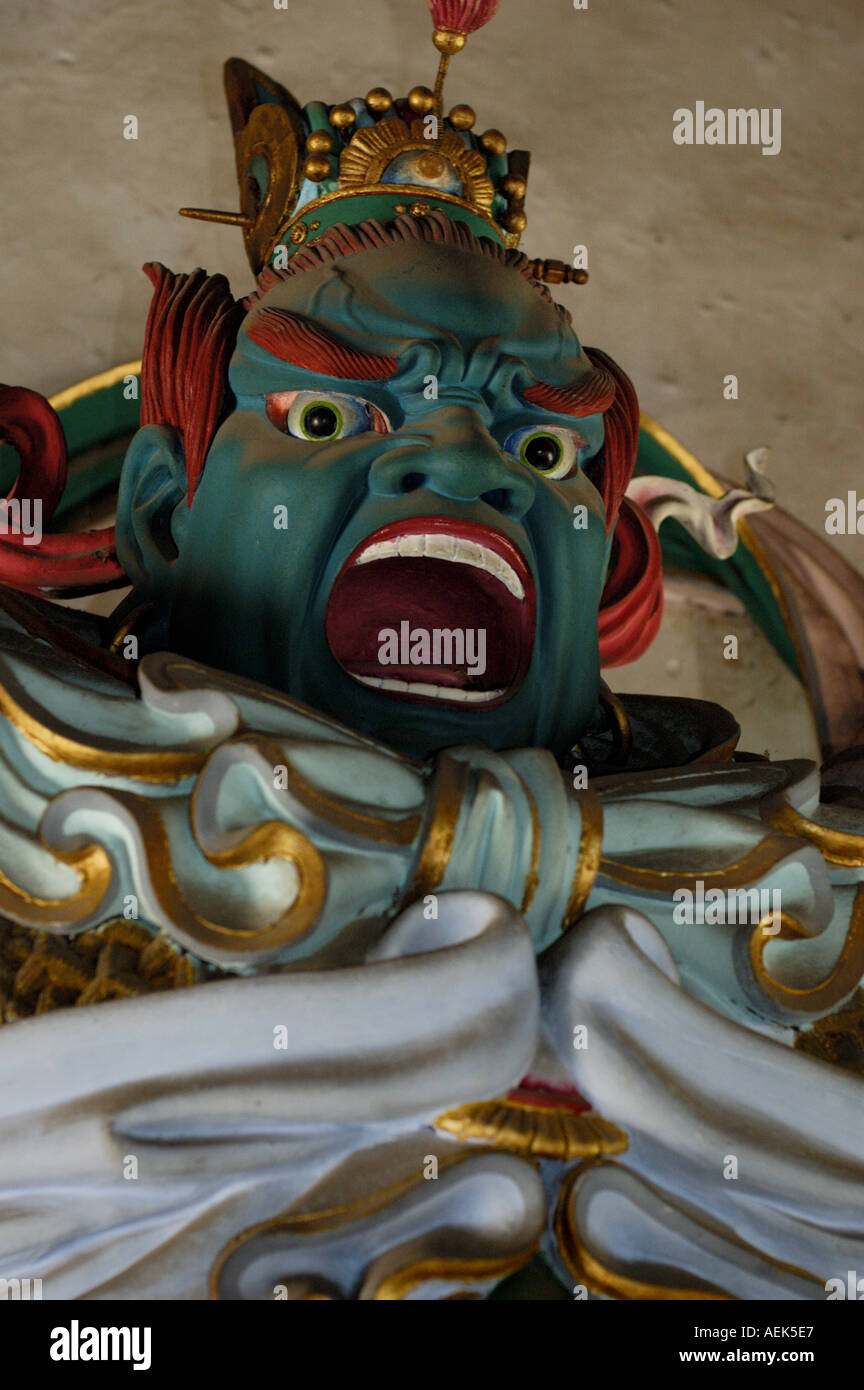 Squisitamente statua colorata a Wo a lungo si (Tempio di Sleeping Dragon), Xian, Shaanxi, Cina. Foto Stock