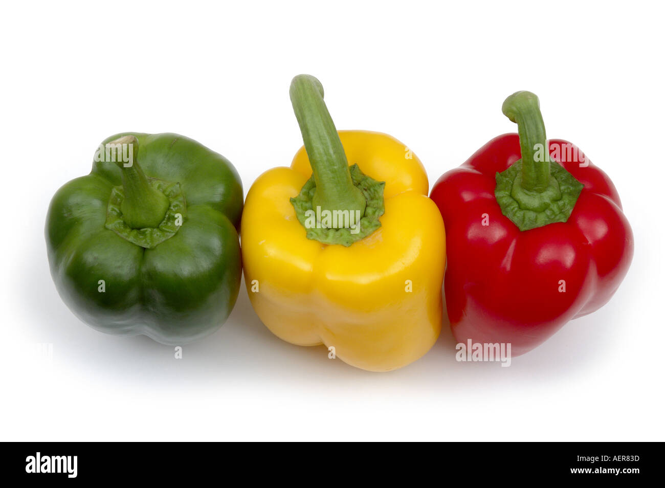 3 di colore differente i peperoni Foto Stock