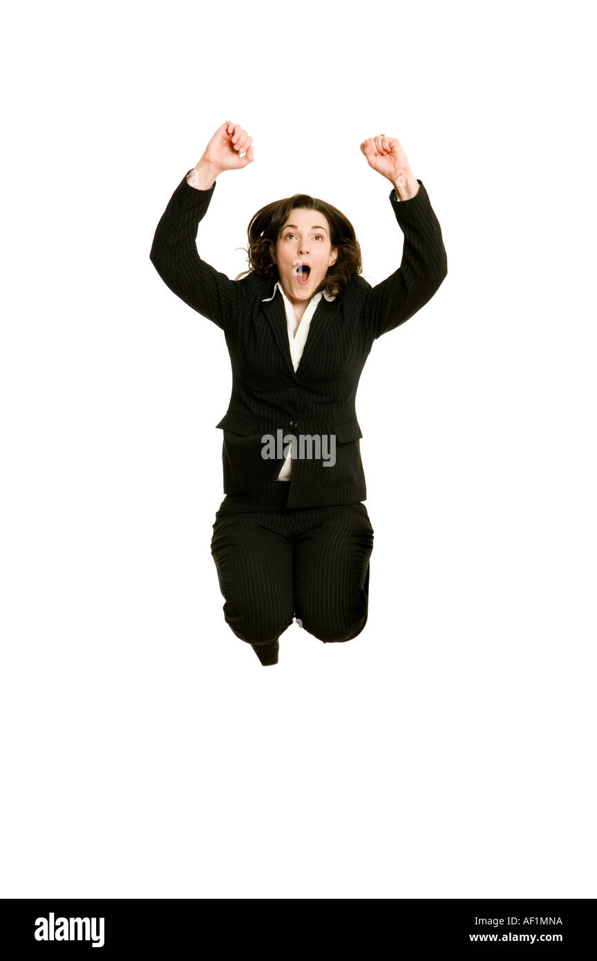 Business donna salta in aria in alto per festeggiare il successo Foto Stock