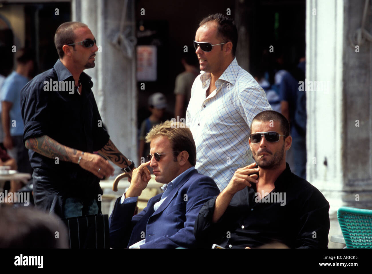 Goodfellas appendere fuori in Piazza San Marco (St. Marco), Venezia, Italia Foto Stock