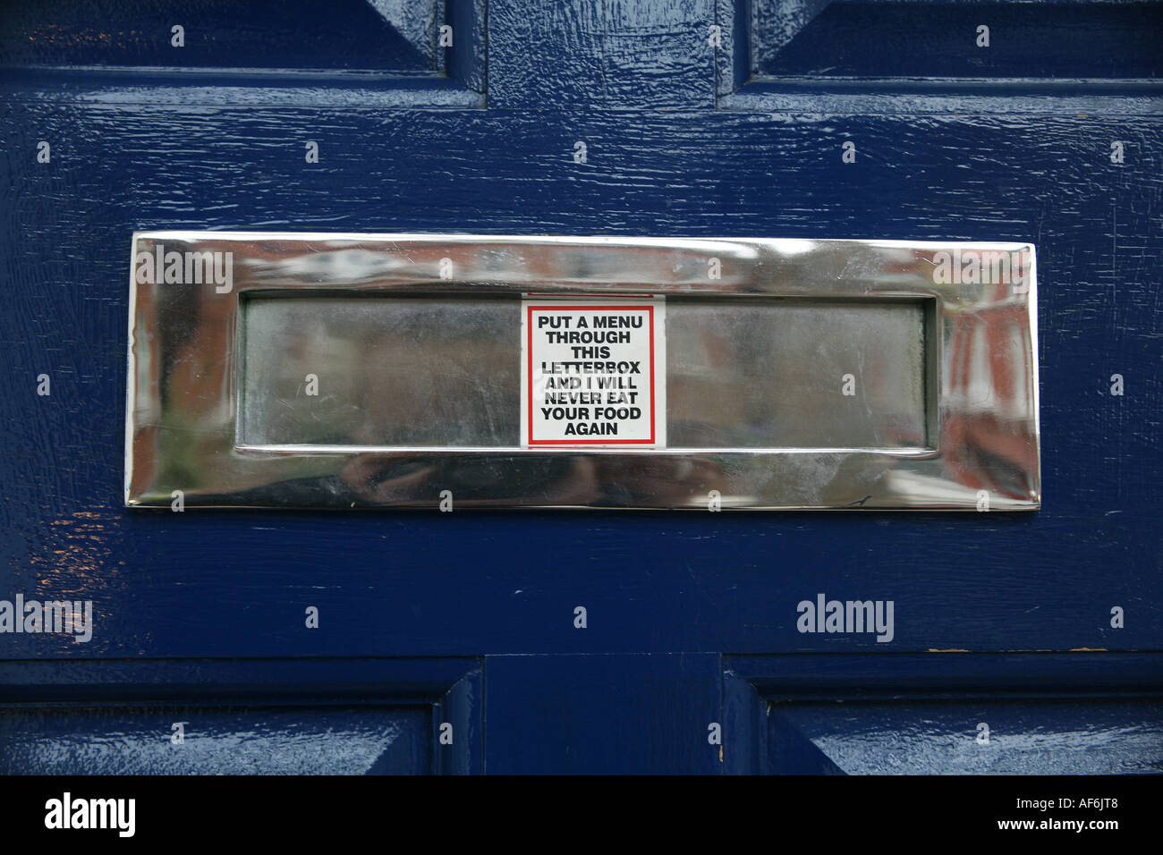 Contro la posta indesiderata adesivo sul letterbox a Londra in Inghilterra Foto Stock