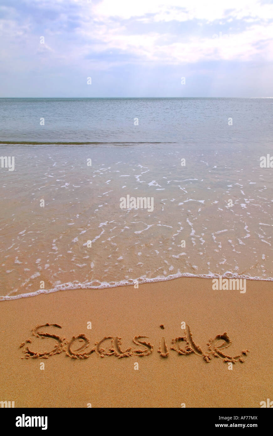 Mare scritto in sabbia su una spiaggia Foto Stock