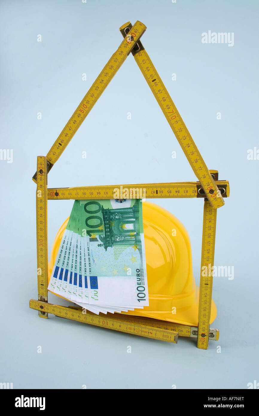 Muratore strumento e delle banconote in euro Foto Stock