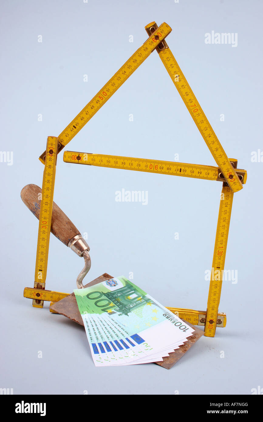 Muratore strumento e delle banconote in euro Foto Stock