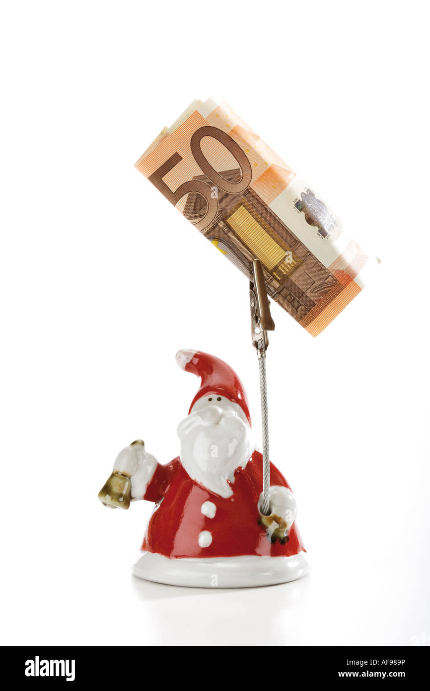 Babbo Natale figurina azienda Euro nota Foto Stock