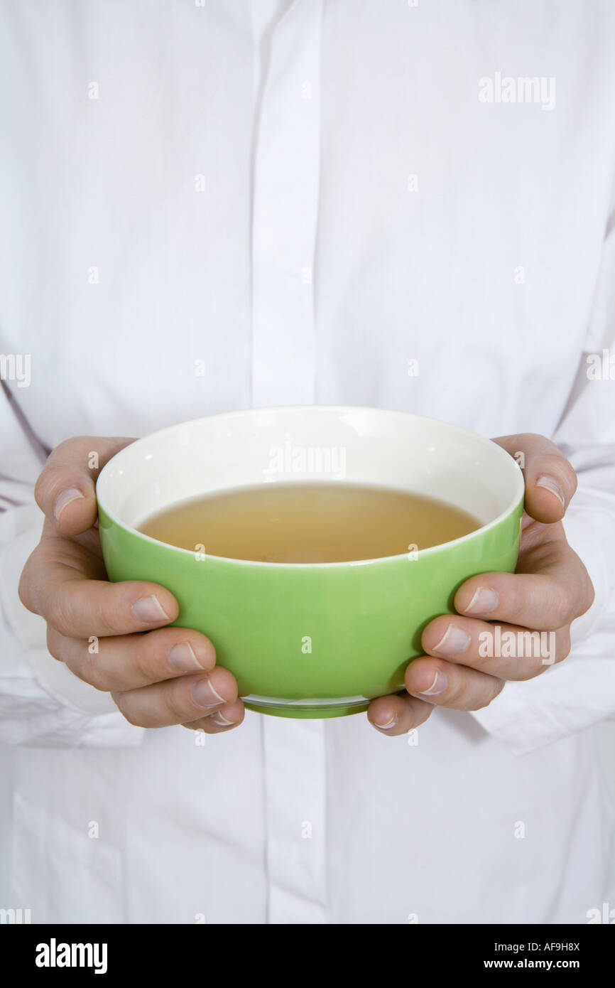 Mani tazza di tè Foto Stock