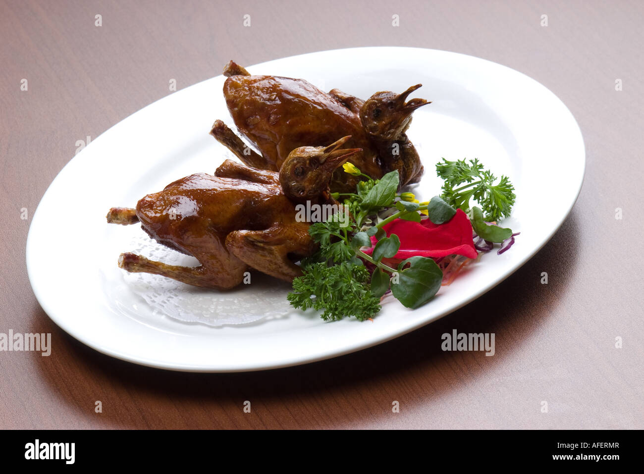 Cibo cinese Grill Fire Bird Pigeon Foto Stock