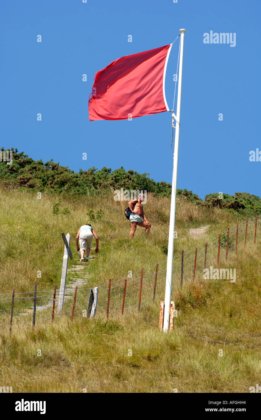 Bandiera rossa, militare poligono di tiro a Lulworth nel Dorset Regno Unito Regno Unito Foto Stock