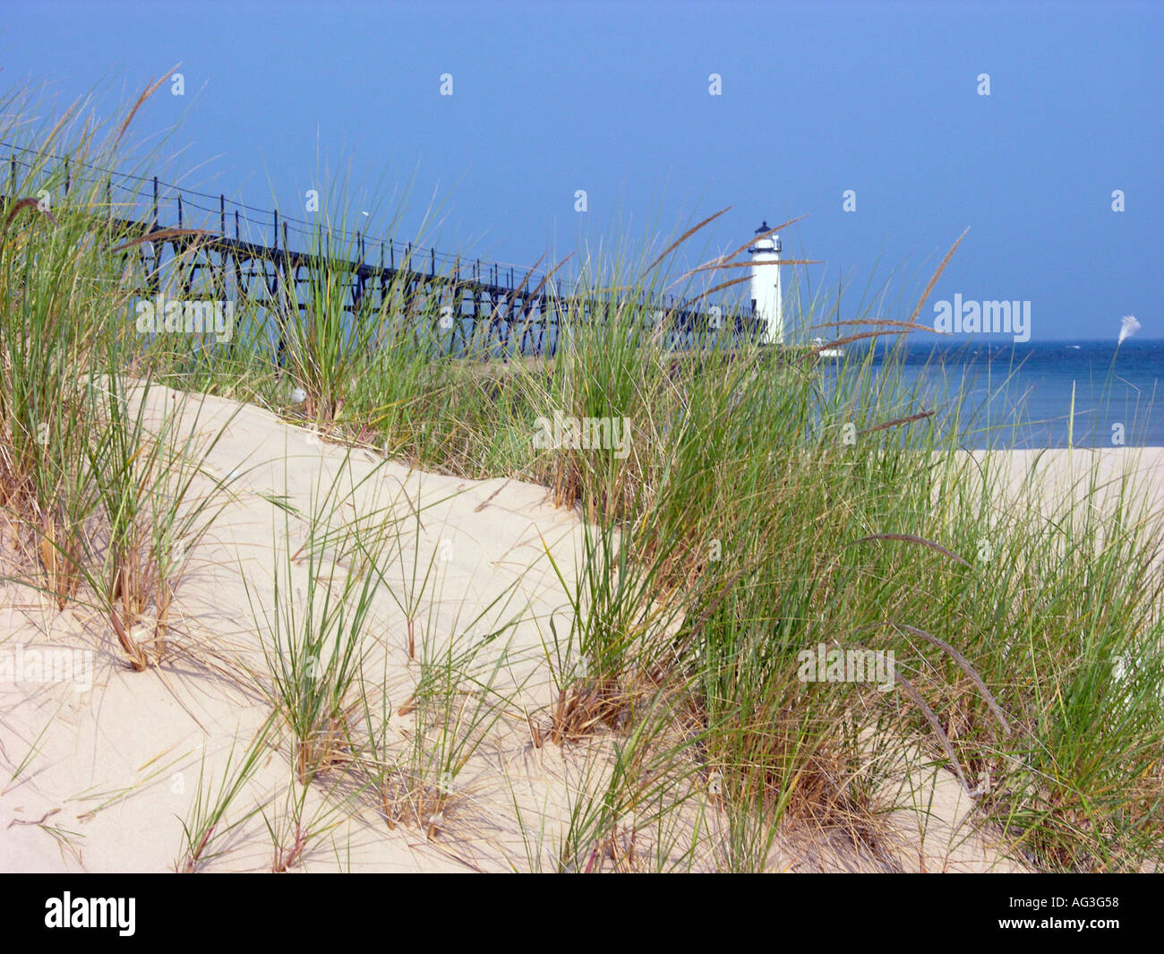 Il faro sul Lago Michigan a Manistee Michigan beach Foto Stock