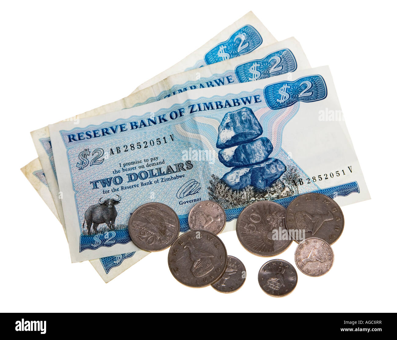 Le banconote e le monete in valuta dello Zimbabwe Foto Stock