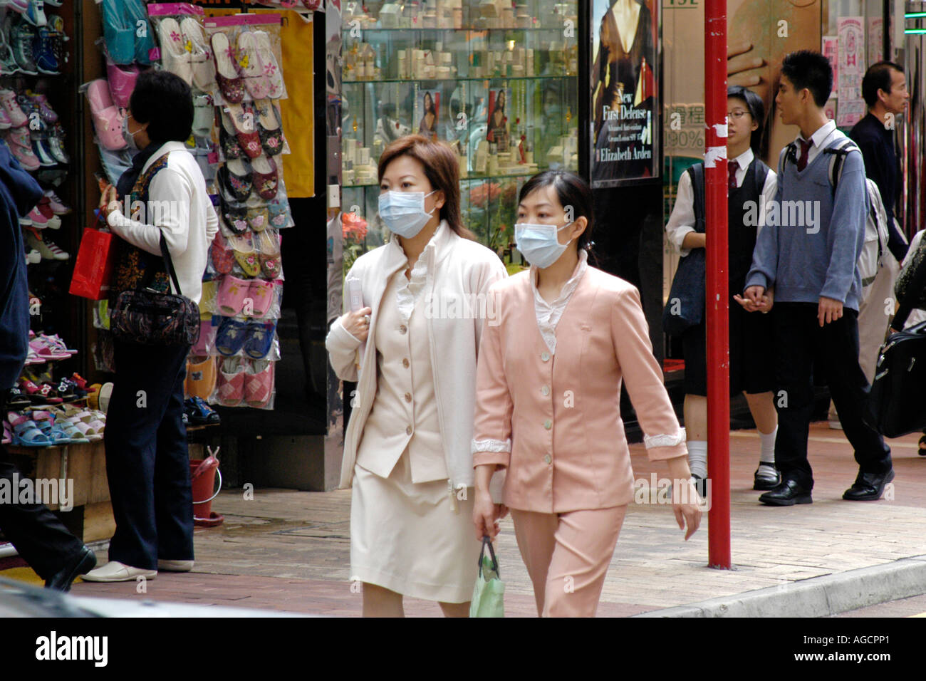 Maschere facciali epidemia di SARS di Hong Kong Foto Stock