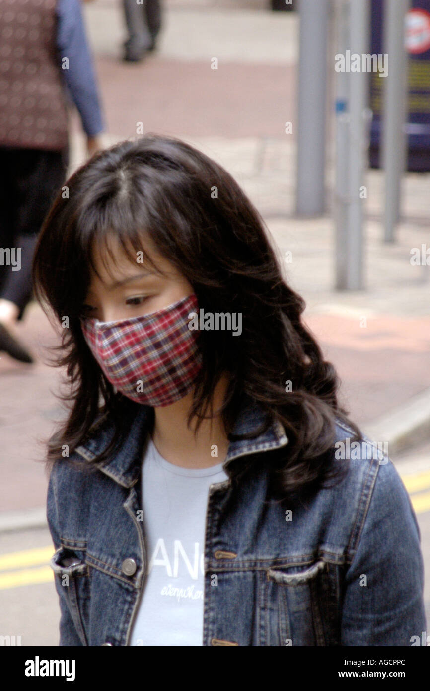 Maschere facciali epidemia di SARS di Hong Kong Foto Stock