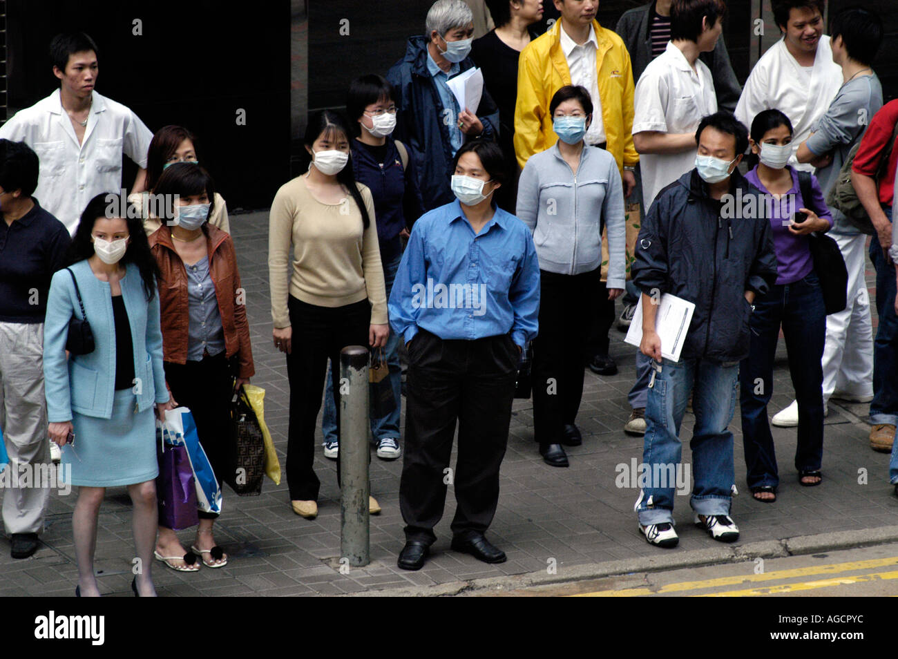 Maschere facciali epidemia di SARS di Hong Kong Foto Stock
