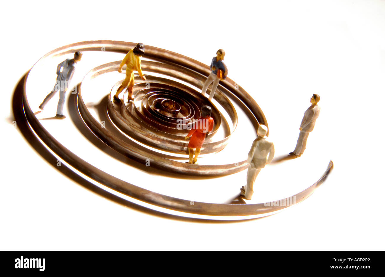 Le miniature sono posizionate lungo una spirale vorticosa, simboleggiando il movimento e l'interazione. Foto Stock